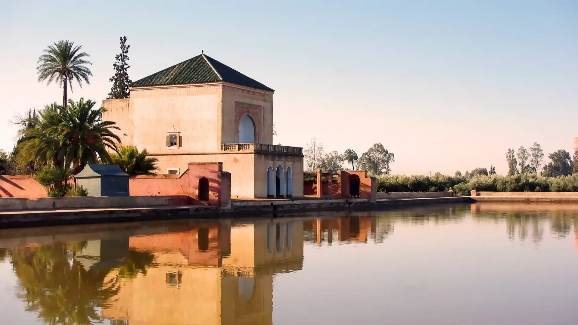 Menara Gardens and Pavilion in Marrakesh, featured on a 6 Days Tour from Casablanca to Marrakech, showcasing serene landscapes.