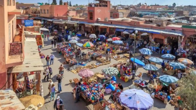 Jemaa el-Fnaa square and market in the medina of Marrakesh, a stop on the 8-day Morocco itinerary from Casablanca.