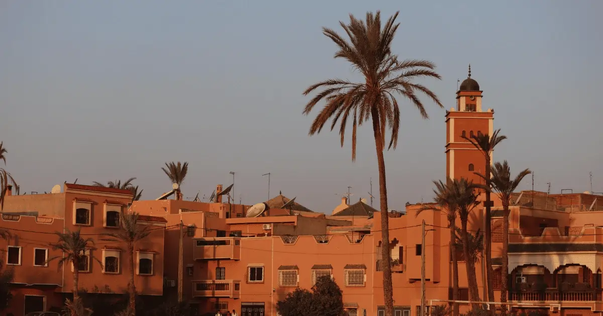 Fes to Marrakech Desert Tour 4 Days 3 City view with terracotta-colored buildings and historic architecture during a Fes to Marrakech Desert Tour 4 Days