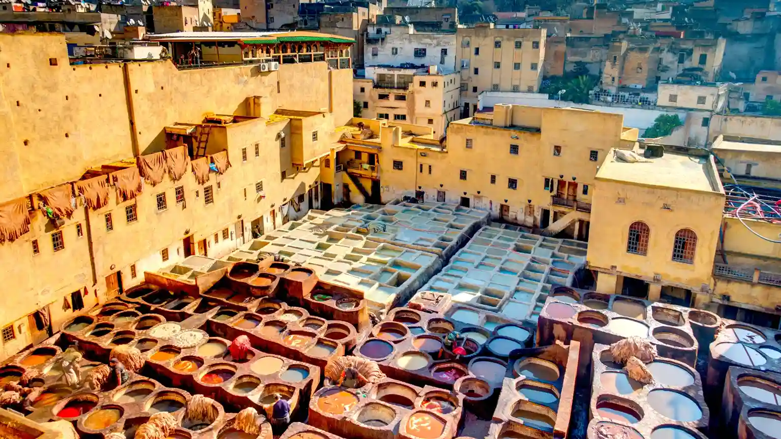 Traditional tanneries in Fez Medina, a UNESCO landmark, featured on a Morocco Fun Tours trip showcasing Morocco’s leather-making heritage.