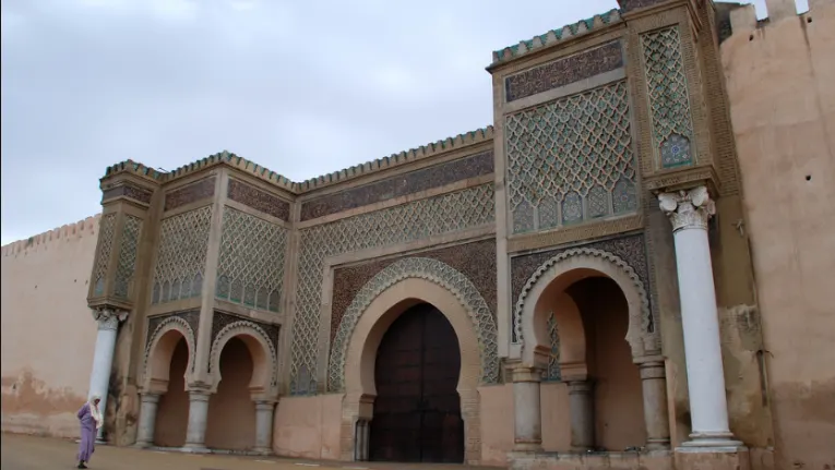 Morocco Itinerary 10 Days 7 Bab Mansour al-'Alj in Meknes, a monumental ceremonial gate featuring ornate Moroccan craftsmanship and historic architectural detail.