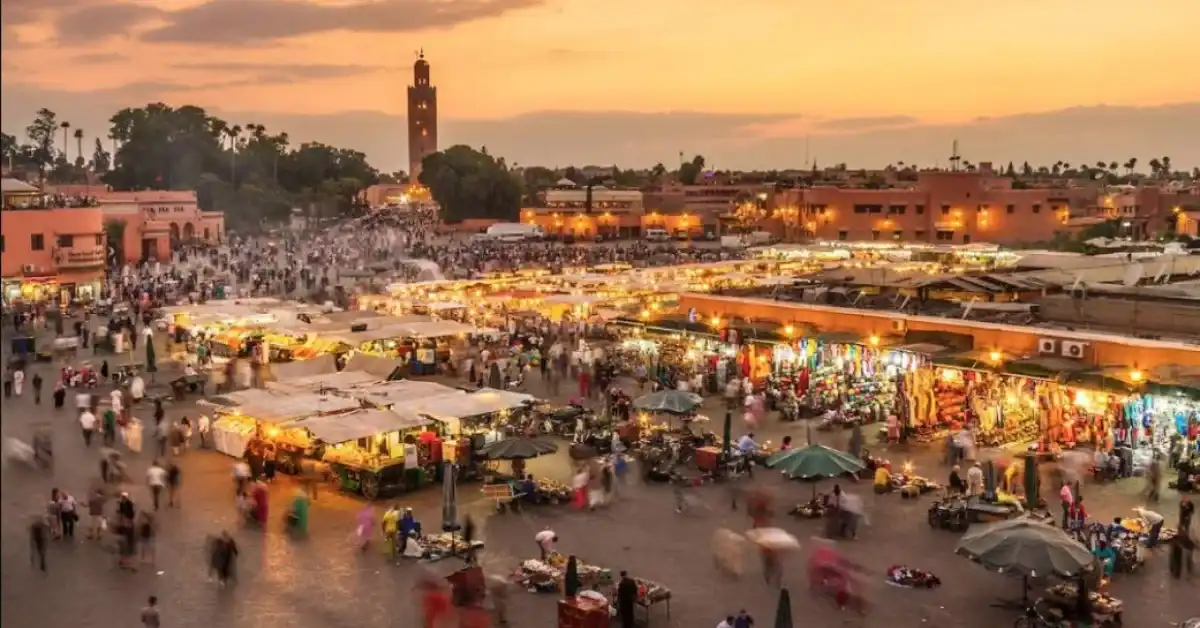 Morocco Itinerary 10 Days 1 Jemaa el-Fnaa in Marrakech at sunset, included as a highlight in a Morocco itinerary 10 days exploring vibrant cultural sites.
