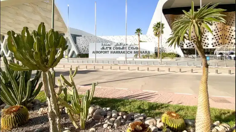 Morocco Itinerary 12 Days 48 Exterior of Marrakesh Menara Airport featuring traditional Islamic design and modern architecture by Morocco Fun Tours.