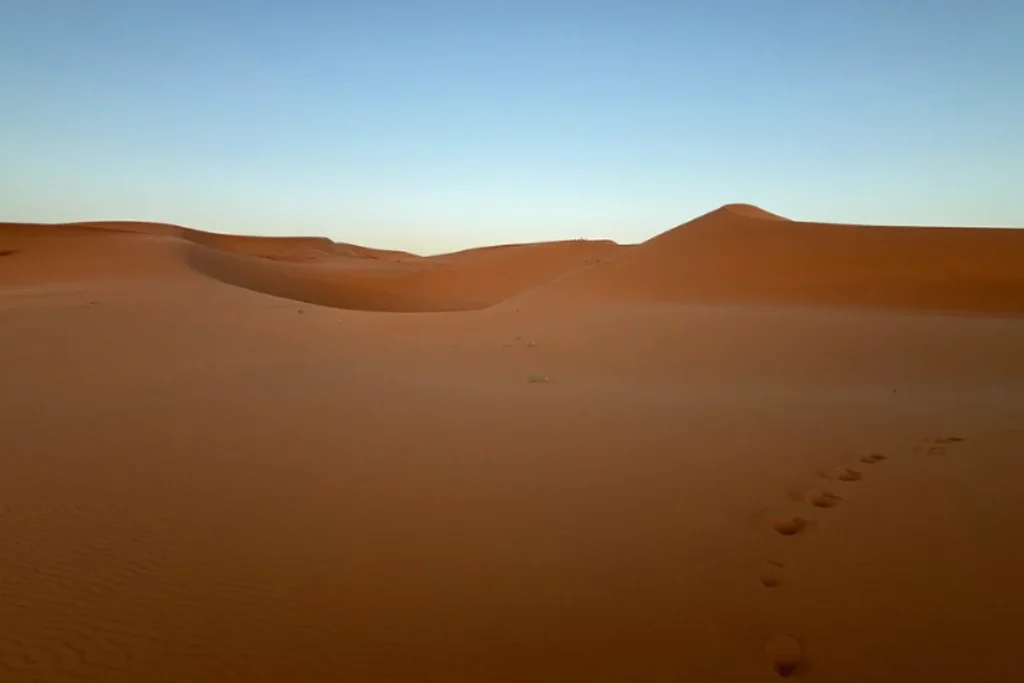 sand dunes, which are  in the Sahara Desert in northern Africa
