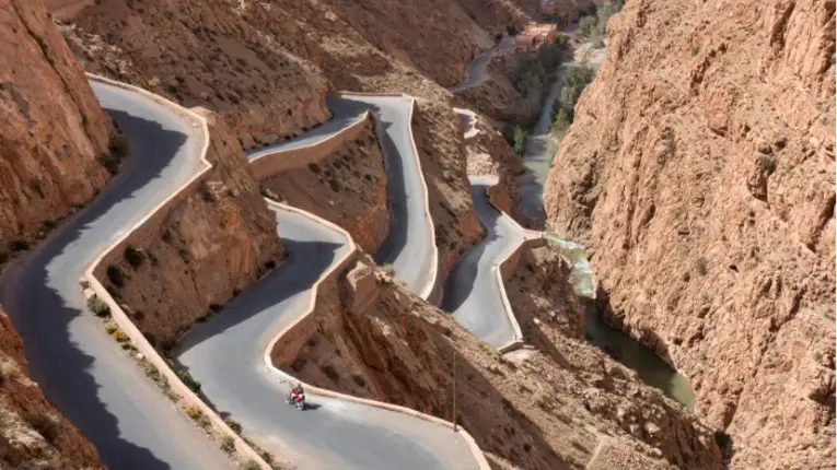 5 Days in Morocco Itinerary 10 Winding R704 road through the dramatic Dadès Gorges in Morocco, showcasing rugged cliffs and striking mountain scenery.