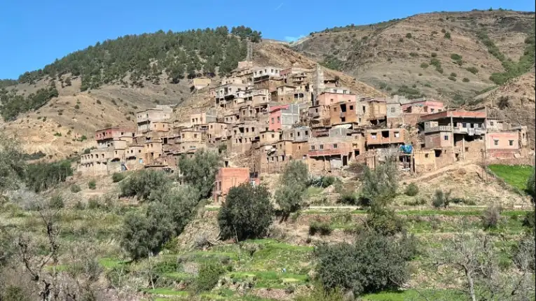 Traditional Berber village in the High Atlas Mountains near Marrakech featured by Morocco Fun Tours with scenic valleys and local culture