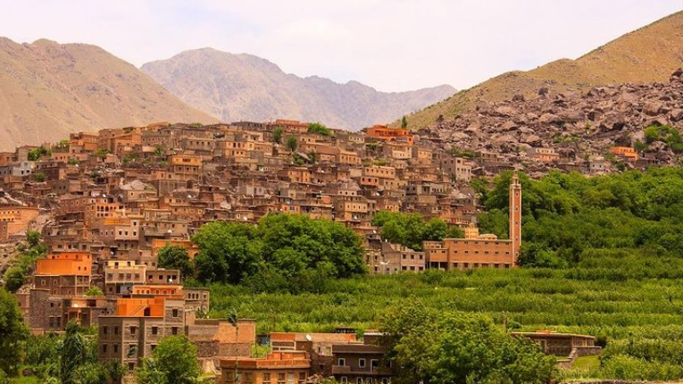 Imlil village in High Atlas Mountains with terraced fields, Berber houses, and scenic peaks serving as base for trekking routes