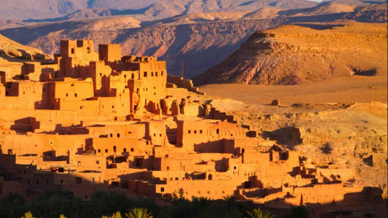 Ait Benhaddou ksar with earthen architecture and fortified walls, a historic landmark explored through Morocco Fun Tours experiences