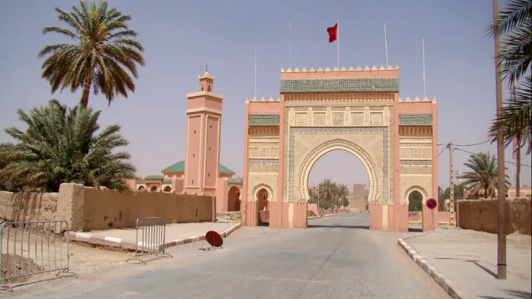 Rissani City Gate with traditional Moroccan architecture and historic significance, a cultural stop during the 3 day desert tour marrakech to fes